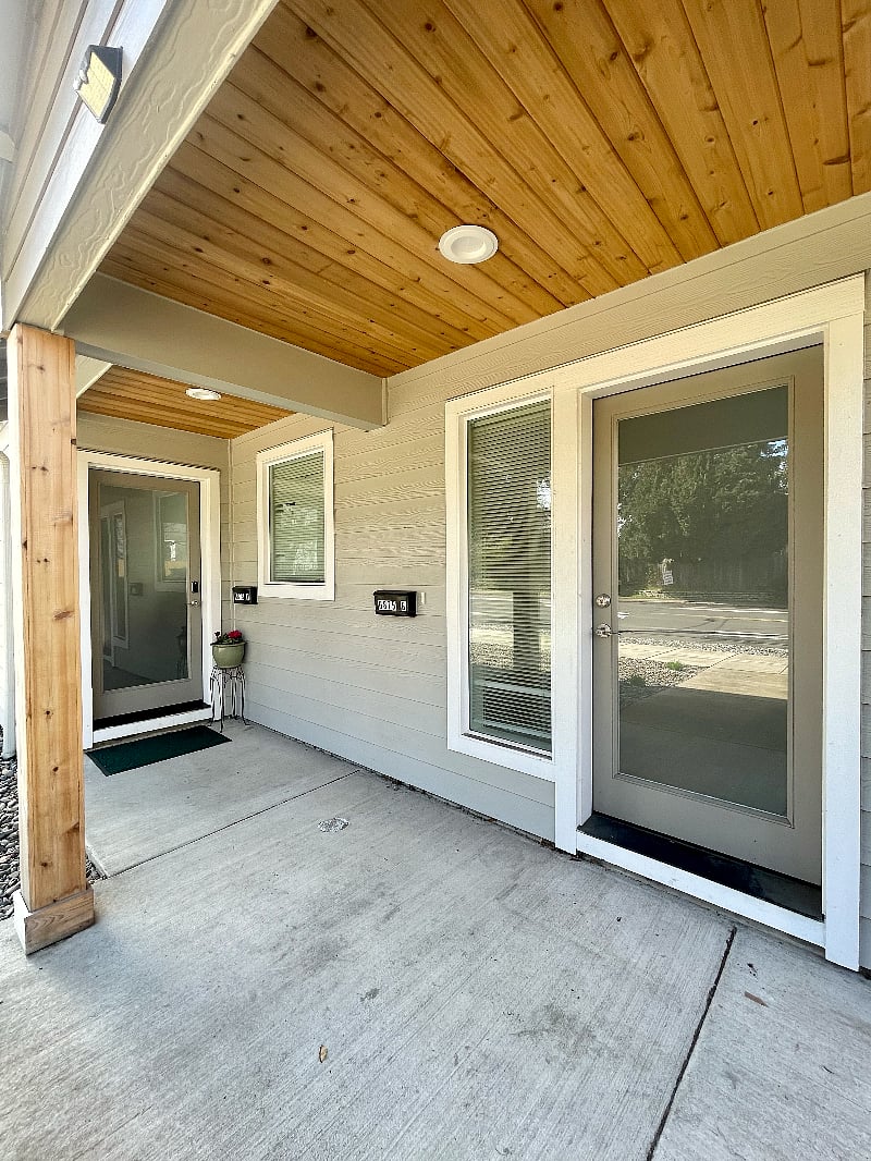Home is divided in half, this unit has private entrance to the right