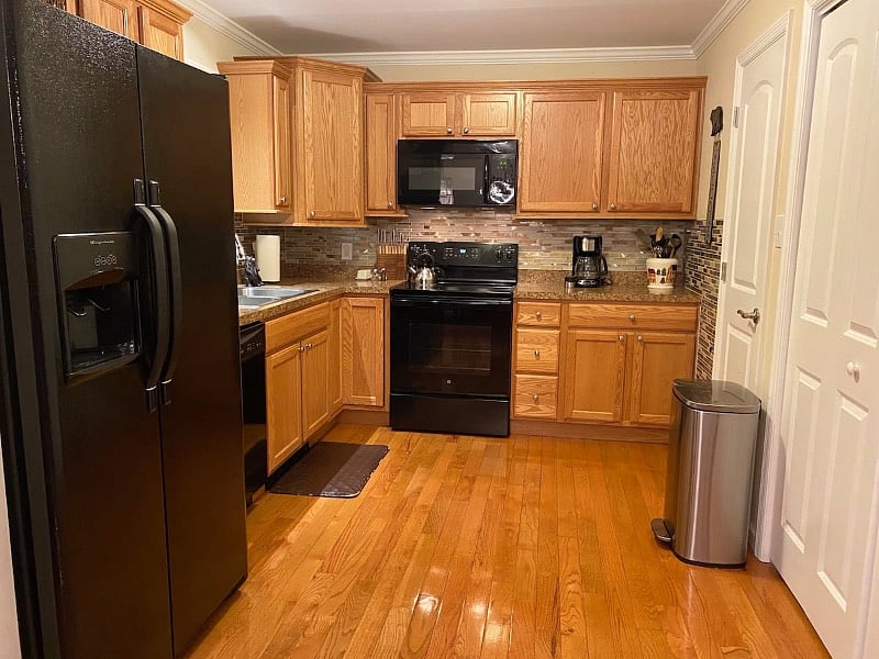 Our kitchen provides you with a Kenmore Suite (Full size refrigerator, dishwasher, microwave, and electric stove), dual sink, coffee pot, panty closet, stainless steel pots and pans, toaster, flatware, dishes, mugs, and wine & drinking glasses.