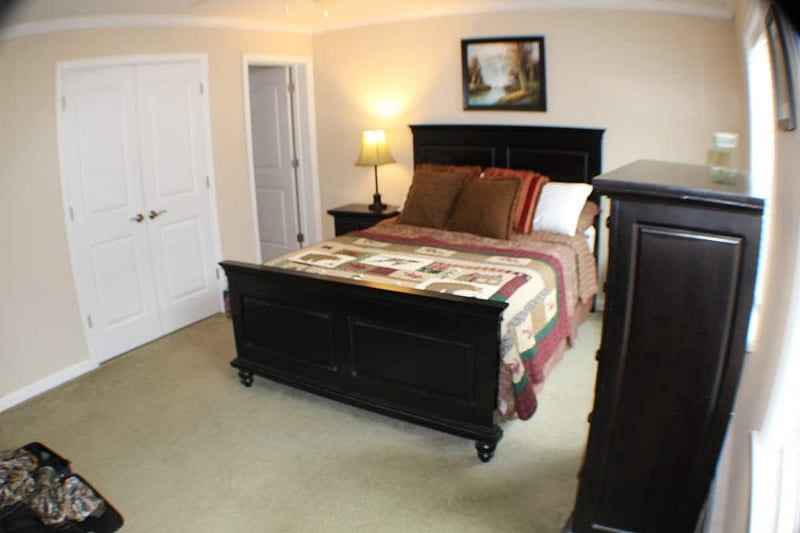 Master Suite bedroom with two dressers a large closet and full ensuite. Each bedroom has its own thermostat.