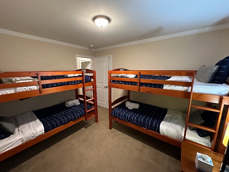 Our Double Bunk Bedroom sleeps four adults (or children) and includes a play area (big enough to play twister) and a large screen TV. Each bedroom has its own thermostat.