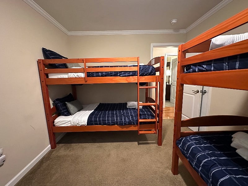 Our Double Bunk Bedroom sleeps four adults (or children) and includes a play area (big enough to play twister) and a large screen TV. Each bedroom has its own thermostat.