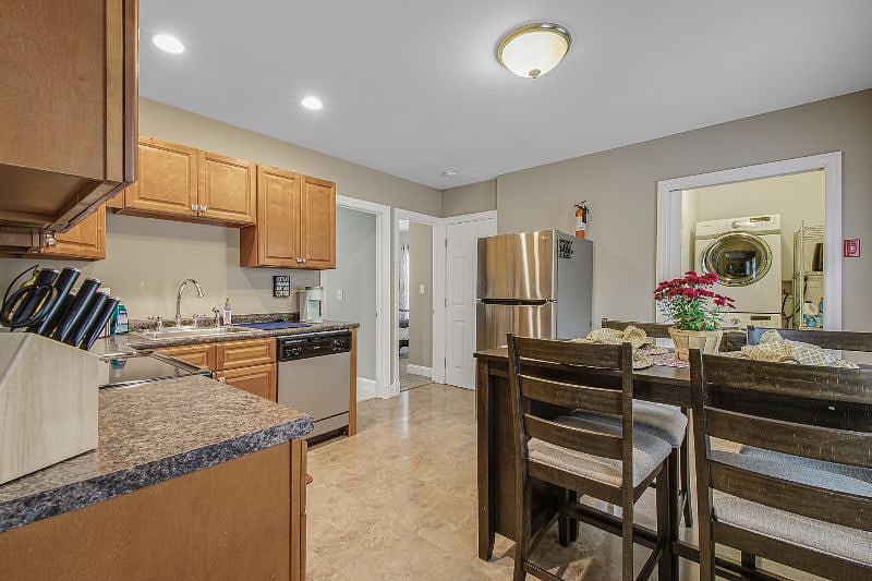 Kichen with full size refrigerator/freezer. Save money and eat better