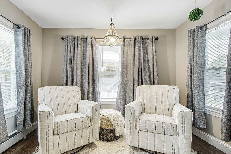 Reading - Sun room. Cozy sun-filled space to enjoy a book or the sun and breezes