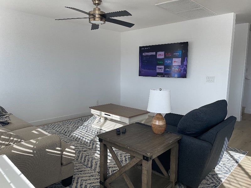 Living room adjacent to the kitchen and dining area, there is one bedroom and one bathroom on this level! Perfect for a guest or roomie! Full Bathroom is adjacent to the room 