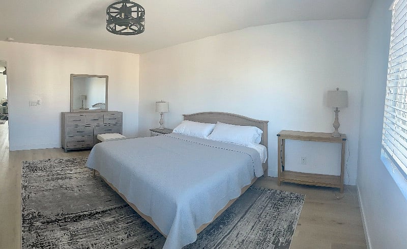 Master bedroom! There is an en-suite large master bathroom with washer and dryer in the closet to the left