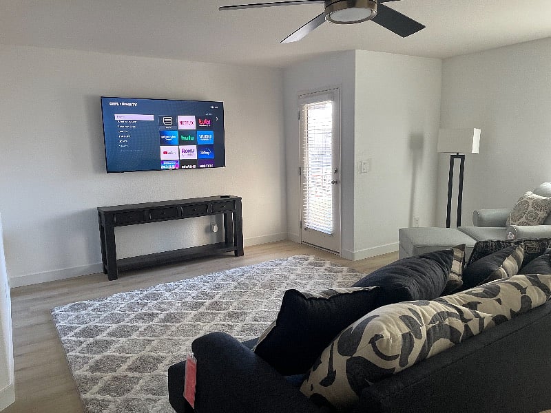 Walk outside the master bedroom and having your own living area with 65 inch smart TV, small patio that overlooks the front of the house