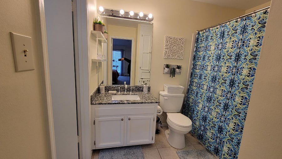 Upstairs bathroom with deep soaking tub.