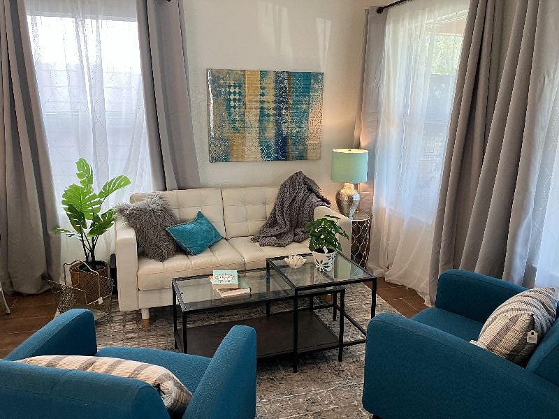 The cozy living room is perfect for settling in with a good book or relaxing with family and friends.