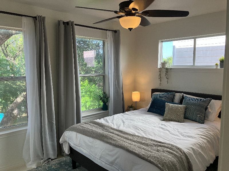 The first-floor Retreat Room is a soothing space filled with calming blues and natural elements.