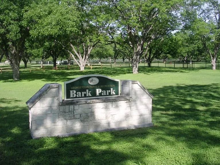 The Bark Park is set in an old pecan orchard and is just steps from Peachtree Cottage's front door.