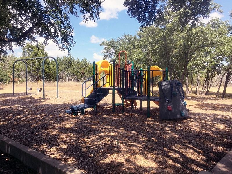 Windridge Village Park is at the end of our cul-de-sac street, and is perfect for children to explore.