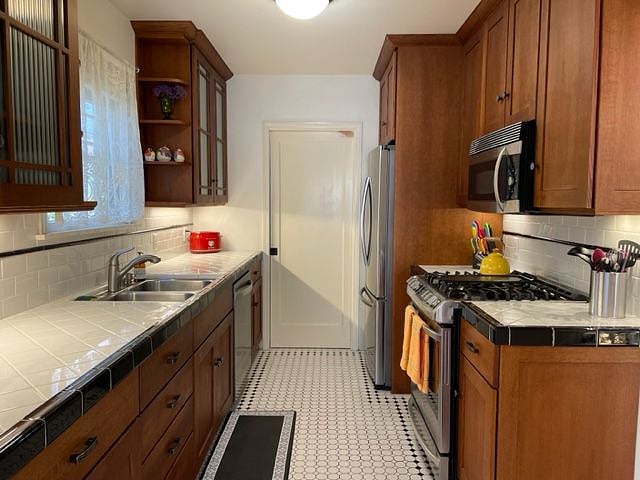 Fully equipped kitchen viewed from the breakfast nook