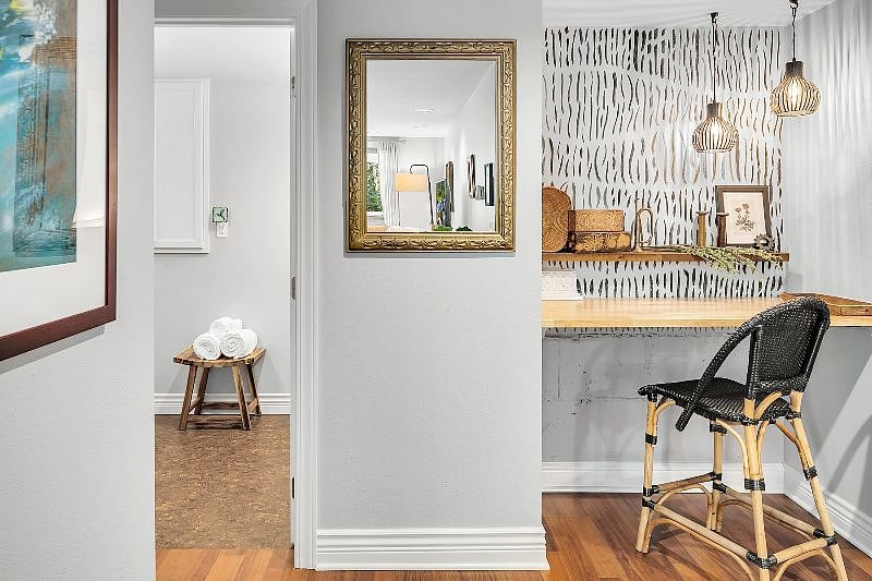 Hallway to bathroom and bedrooms with hallway nook (can be used as a workspace or a flat surface to fold clothing or iron)