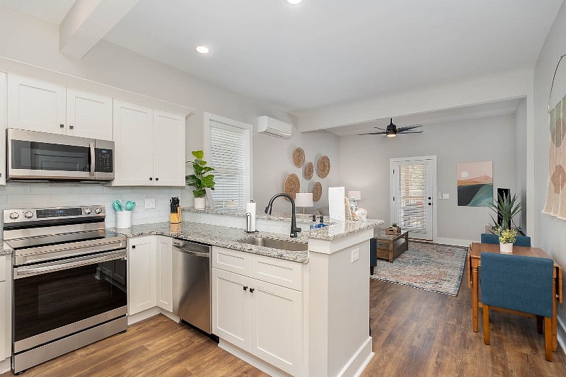 Enjoy the bright and spacious open-concept kitchen, dining and living spaces. 