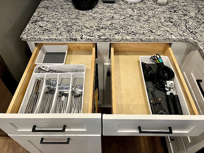 Utensils, measuring cups/ spoons, can opener, wine opener and more.