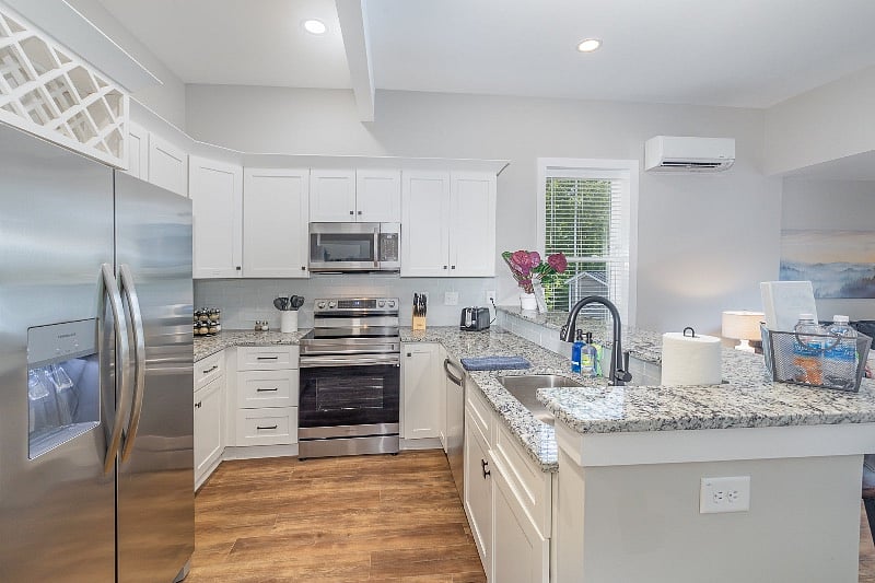 Well-equipped and labeled kitchen cabinets make cooking and clean-up a breeze! Enjoy the Keurig coffee maker, electric tea kettle, toaster and more. Your home away from home.