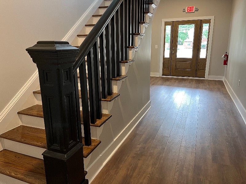 Interior of the building with stairs leading to your 2nd floor condo.