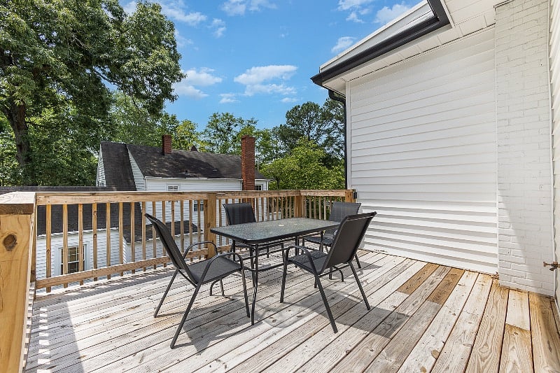 Enjoy tree-top views of the neighborhood from your 2nd story private deck.