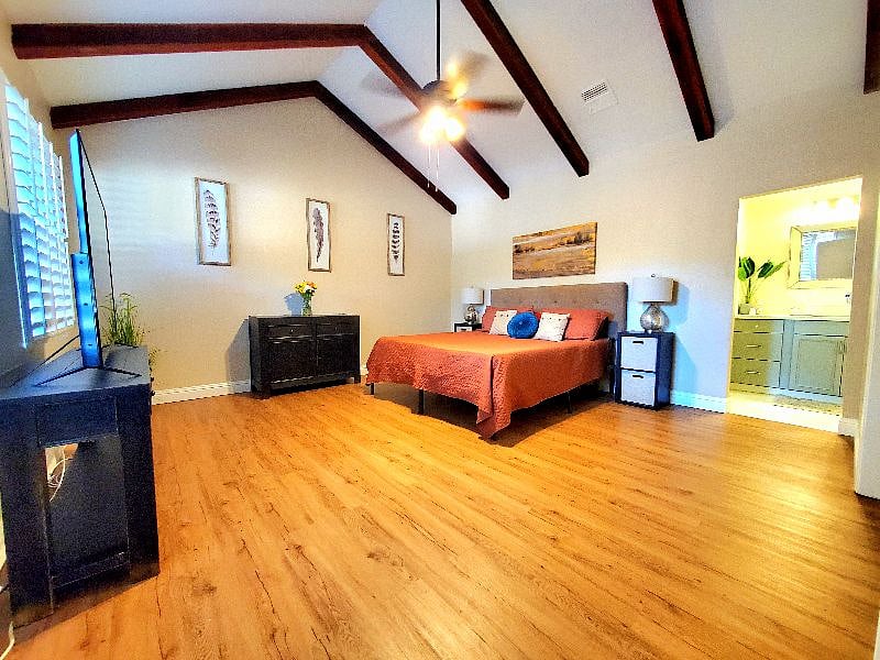 High ceilings and plenty of storage in bedroom