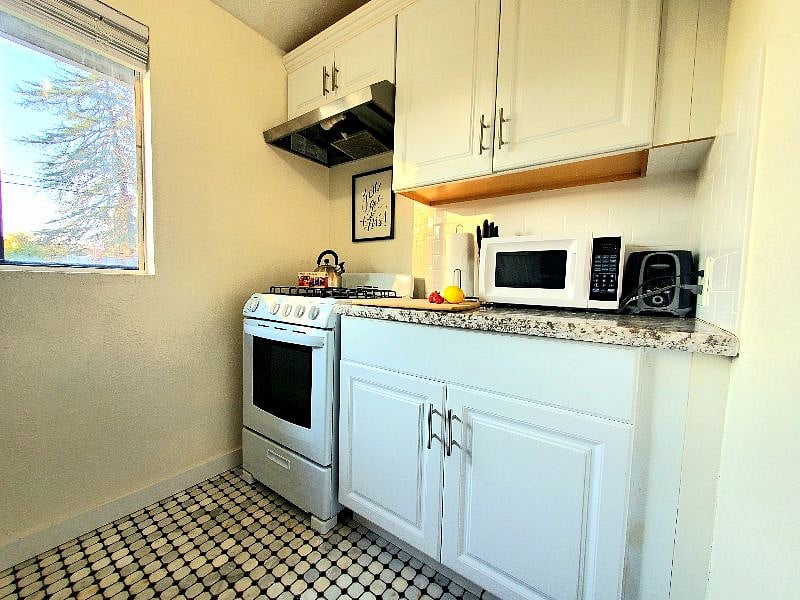 Microwave, toaster, and coffeemaker all available. 
