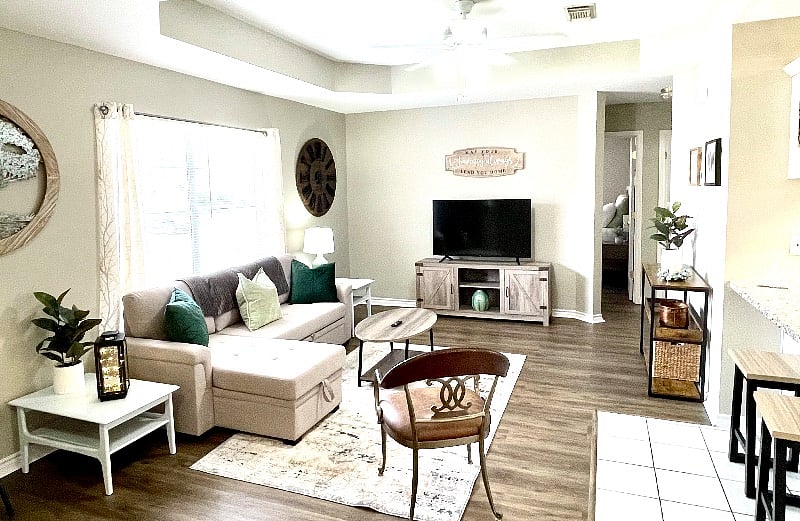 Comfy living room has a pullout sofa that sleeps 2 children comfortably, with a chaise lounge. 50" Amazon Fire Smart TV loaded with all the top streaming apps to keep up with your favorite shows!