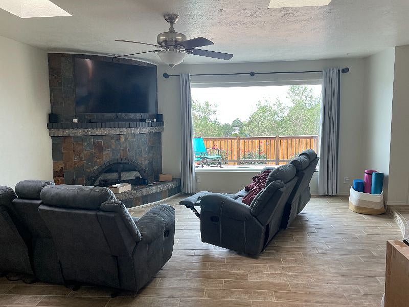 Kiva natural gas fireplace and 55" Smart TV
