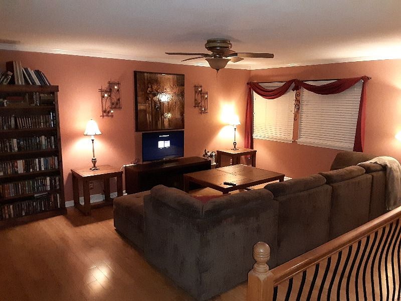 Main level living room. Open concept w/ Kitchen.
