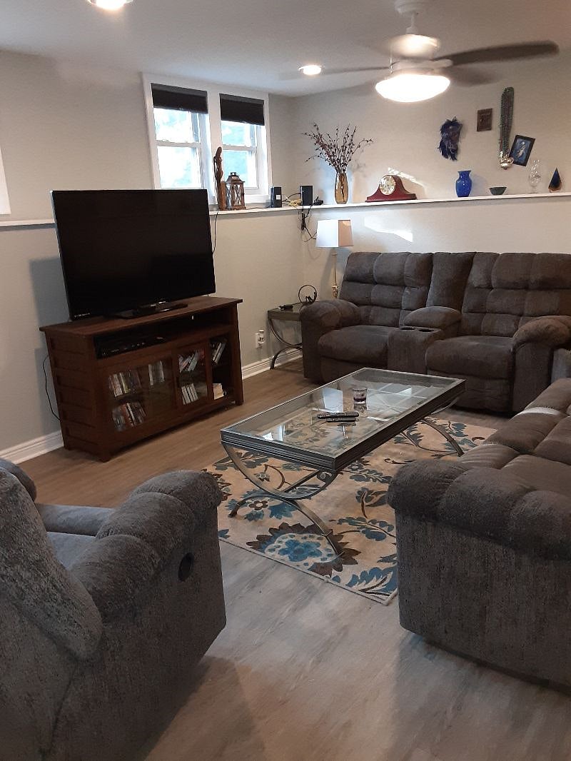 Lower level living room. Internet. Firestick application for streaming.