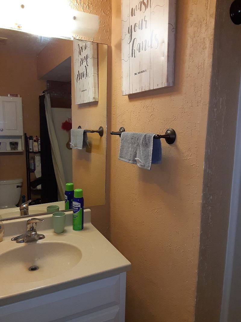 Private upper level main bath vanity/sink w/ drawer storage.