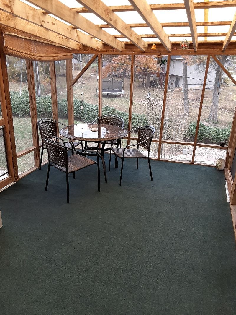 Screened in & furnished back yard deck off main level. Sliding door from kitchen.