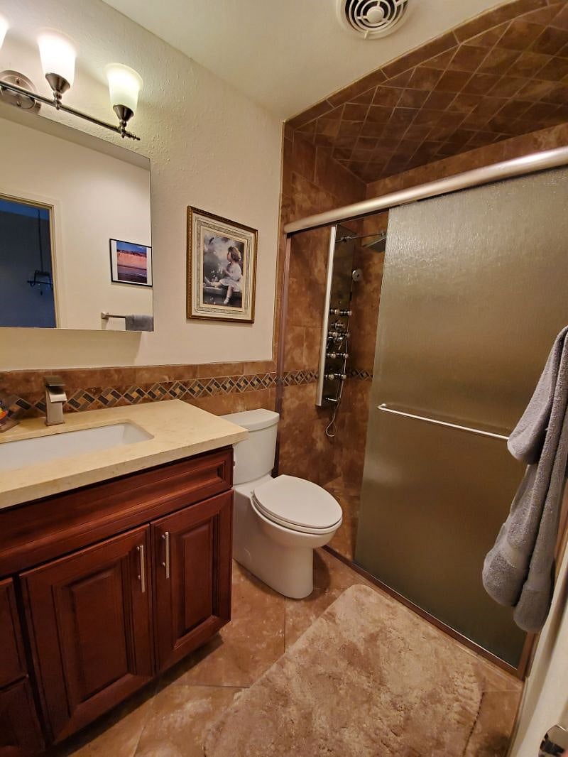 Bath has steam bath style multi-spray system installed.
