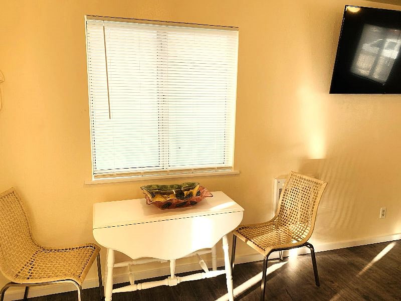 Table folds to seat more than 2