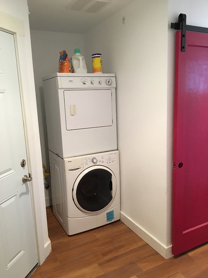 Washer and dryer provided.  Shared space as owners access to garage through this space.