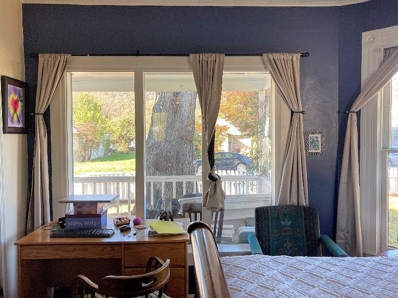 This is a closer view of the small desk and other big windows in this downstairs bedroom. It is so sweet to open these drapes and let the sunshine in :-)