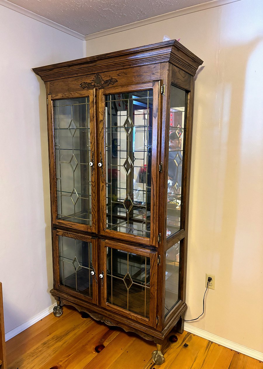 This china hutch is on the other side of the dining room - this and the dining room and living room sets were all gifts my mother wanted me to have after her passing - it used to be full of 50 years of collecting bells - all of which she passed on to family and friends.