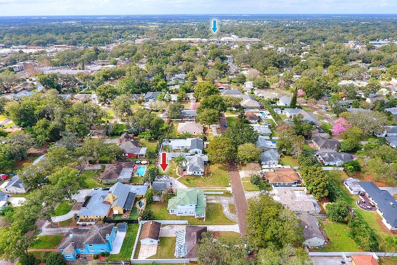 Our Cottage (Red Arrow) and the iconic Southgate Publix Grocery Store (Blue Arrow); a short 3 minute drive up our street.