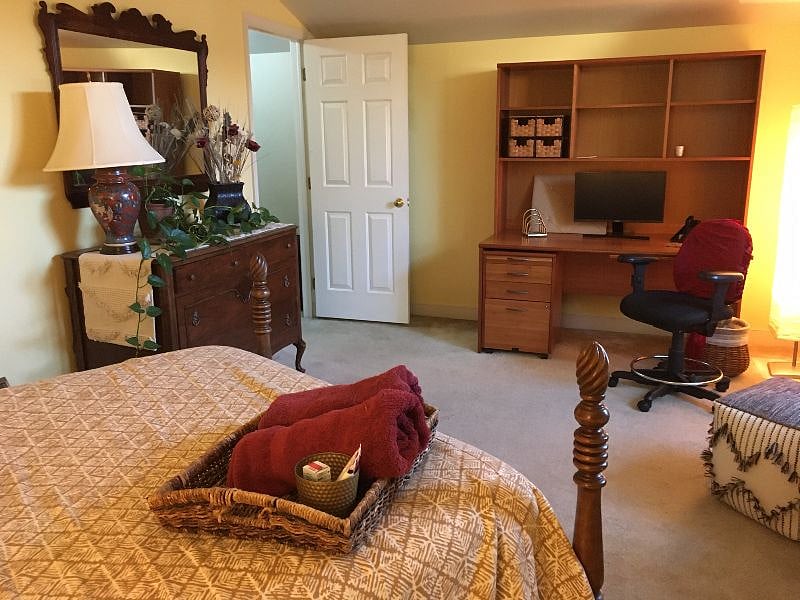 Yellow bedroom/2nd view of desk area. 