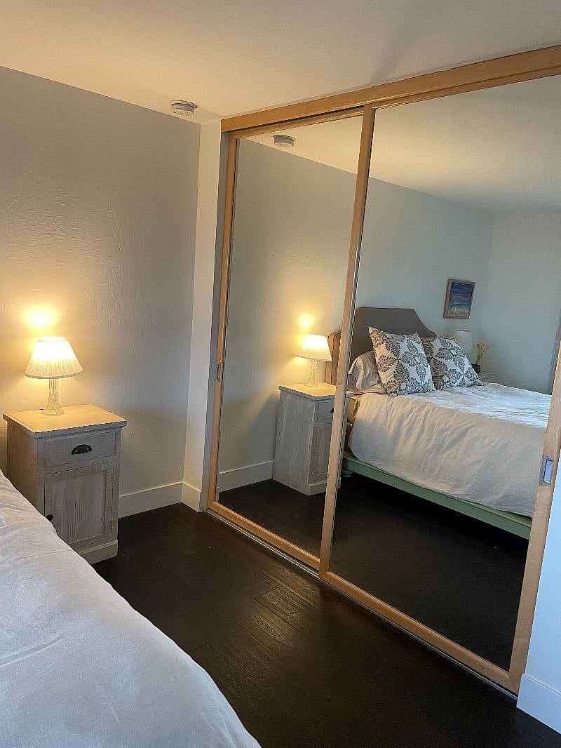 10' closet w/ floor to ceiling mirrors.
