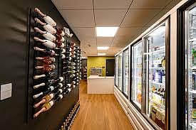 Wine and other miscellaneous items convenience store, dry cleaners, clothing alterations, and hair salon.