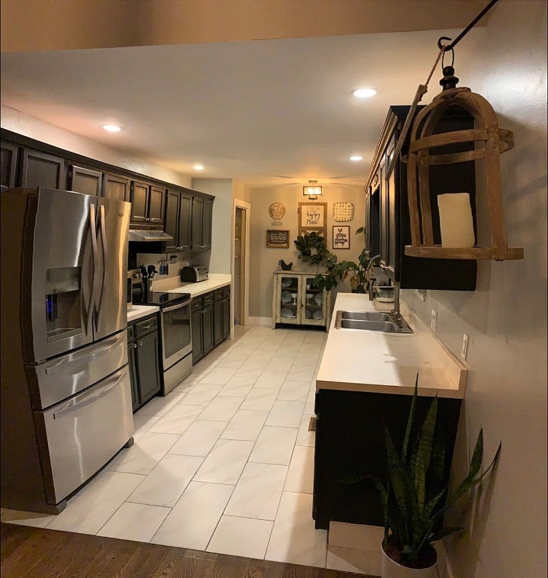 Galley kitchen with Stainless steel appliances 