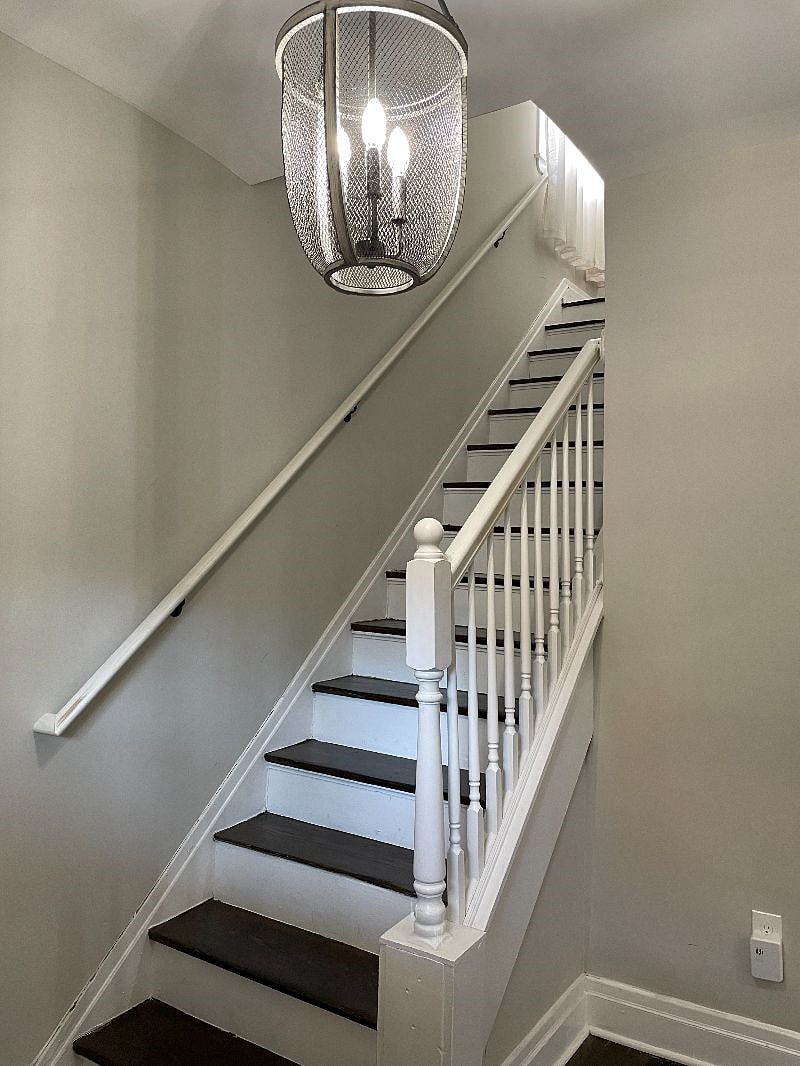 Stairs to second floor primary bedroom and large second bedroom
