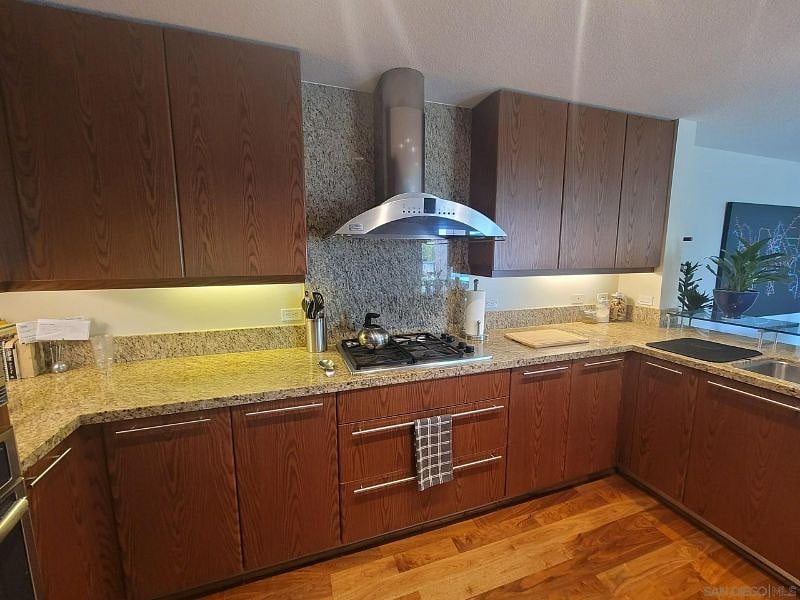 Full-size kitchen with appliances, dishware and silverware