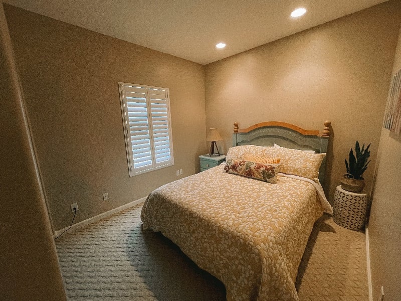Downstairs Bedroom 1 with a Queen bed and Smart TV.