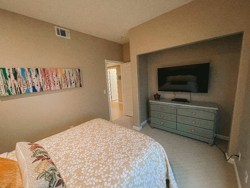 Downstairs Bedroom 1 with a Queen bed and Smart TV.