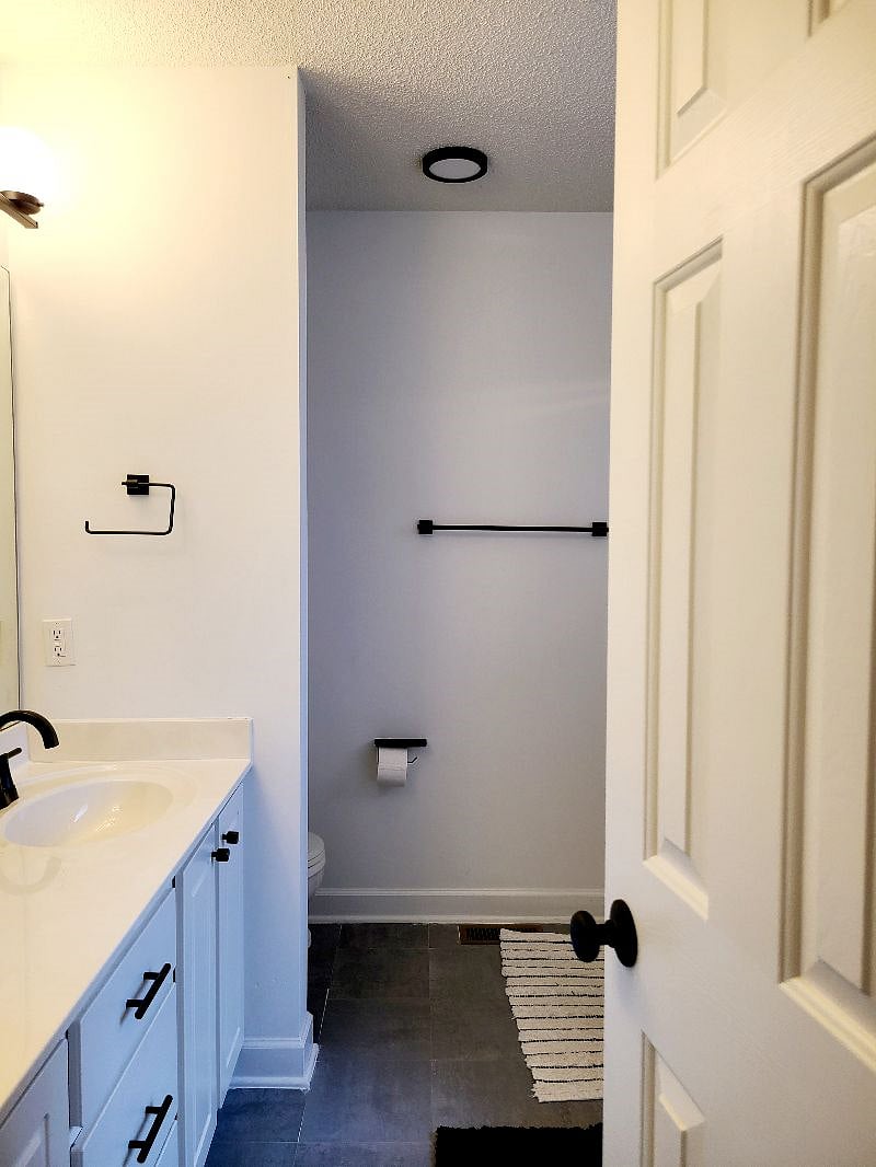 Main bathroom view from bedroom.