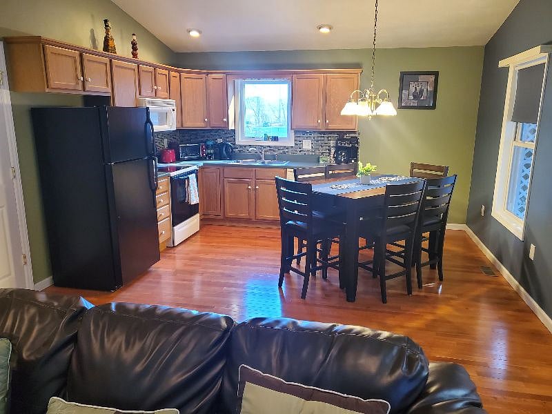 Fully stocked eat in kitchen.