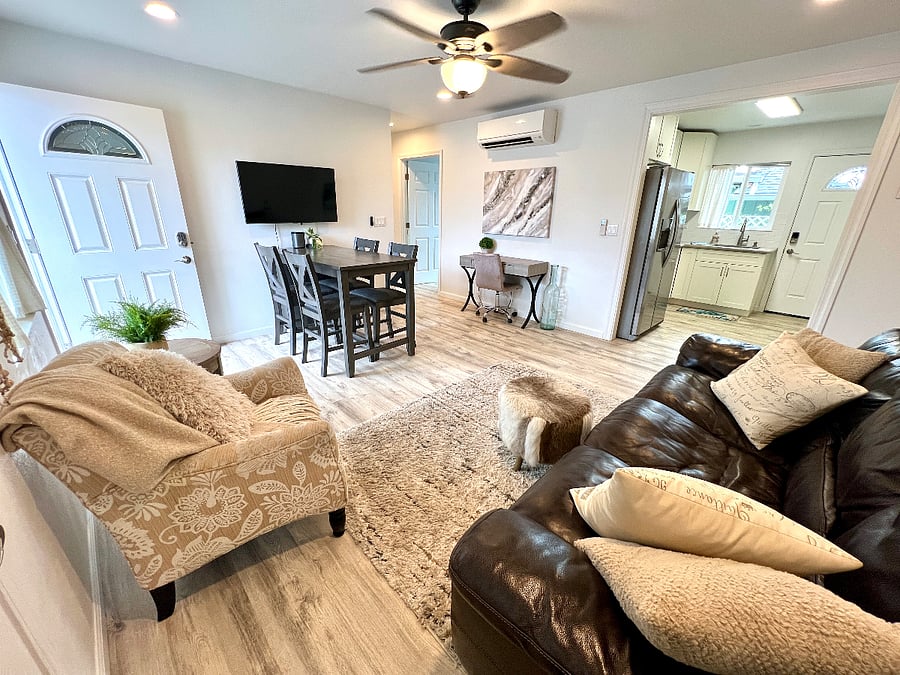 Downstairs 3/1 Living and Dining Area with Desk and TV
