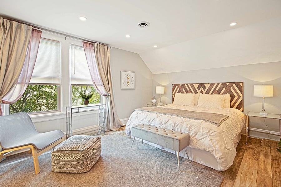 "Beds were so comfortable - we all slept great!" - our guest Mike in his review. The king bed with luxury linens and blackout curtains ensure restful nights, plus a cozy window sill seating area for reading, morning tea, or private phone calls.