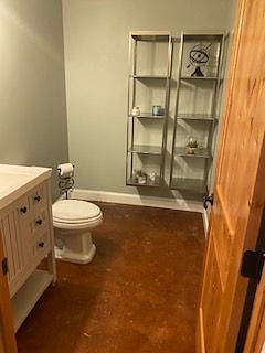 Shared 1/2 bath in the basement near home gym