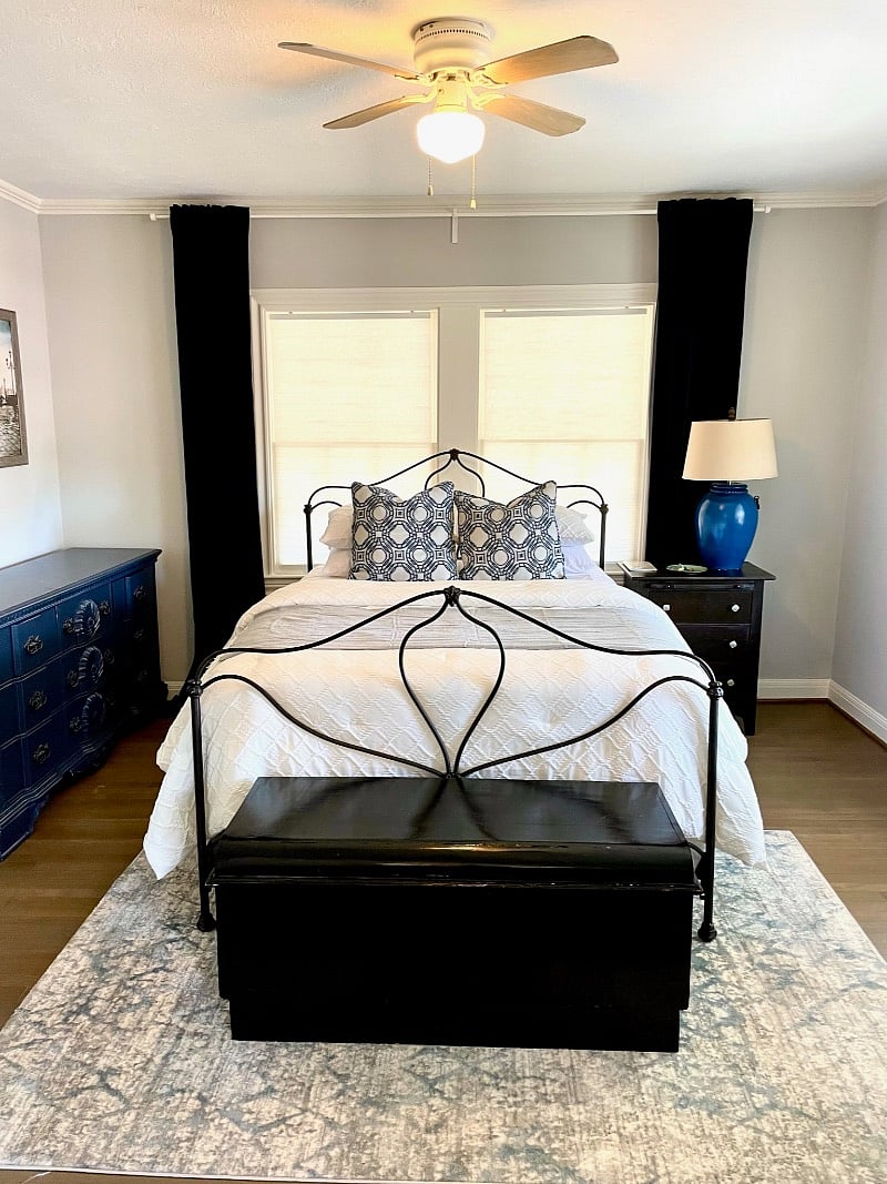 primary bedroom with bathroom access and 4 windows